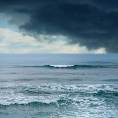 Naklejka na ściany i meble seascape image of stormy day on beach