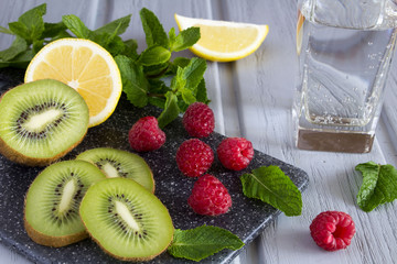 Ingredients for cooking detox water on the grey wooden background