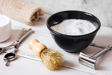 Mens hairdressing wooden desktop with tools for shaving