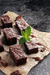 homemade chocolate brownies on grey vintage background, chocolat