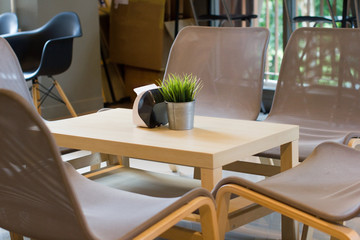 Table and chair in coffee shop.