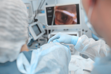 Doctors focused on the process of medical procedure