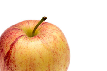 rot oranger Apfel mit Stiel auf weißem Hintergrund isoliert