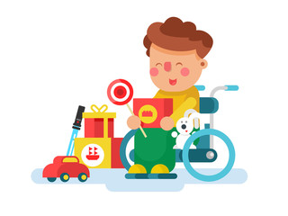 Boy in a wheel chair with toys