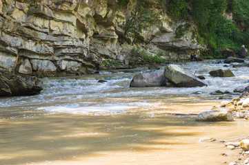 background landscape with waterfall in Yaremche vilage in Ukraine