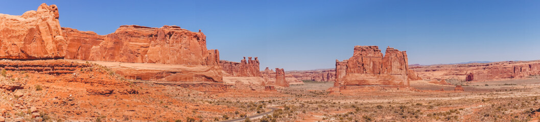 Fototapeta premium Cliffs and monuments in the Arches National Park, USA. Desolate panorama