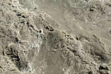 Muddy water in a mountain creek