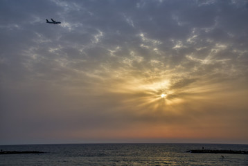 Fototapeta na wymiar airplane and sunset
