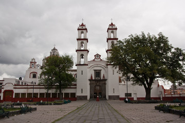 cloudy church in Puebla, Mexico