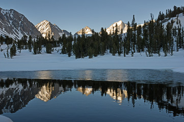 Mountains Reflected In Icy Pool