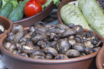 Grilled vegetables and chicken on wooden table overhead shot