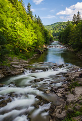 background landscape with waterfall in Yaremche vilage in Ukraine