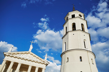 Fototapeta na wymiar Bell tower of Vilnius cathedral over the blue sky