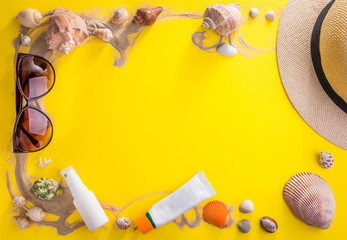 Vacation concept. Sand, seashells, cosmetics and accessories
