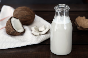 Fresh coconut milk in glass bottle