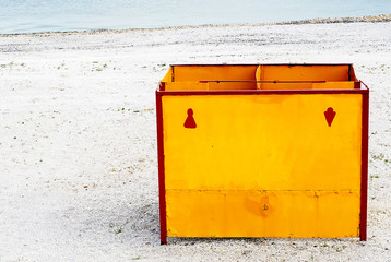 Old dressing room on an orange beach