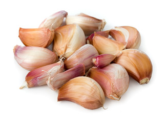 Cloves of fresh young garlic isolated on white background
