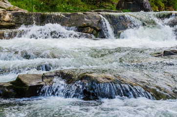 Obraz premium background landscape with waterfall in Yaremche vilage in Ukraine
