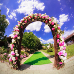 Flower wedding gate in the hotel yard