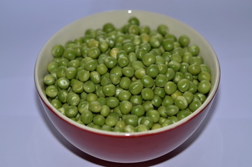 Red bowl with peas