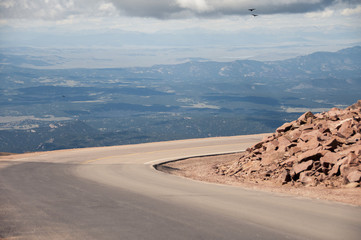 Winding road on pikes peak, view of valley