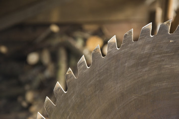 Saw blade for wood, wood on background