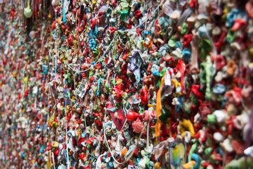 Fototapeta na wymiar The Market Theater Gum Wall is a brick wall covered in used chewing gum, in an alleyway in downtown Seattle.