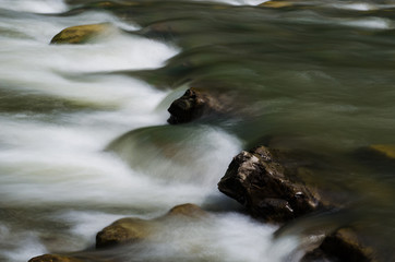 background landscape with waterfall in Yaremche vilage in Ukraine