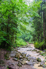 background landscape with waterfall in Yaremche vilage in Ukraine