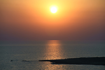 Sunset in salento looking at the park of Porto selvaggio