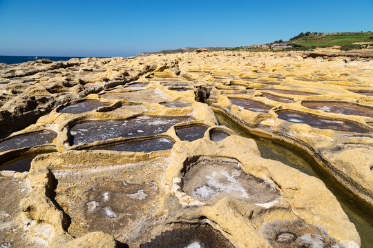 Salt evaporation ponds off the coast of Gozo.Xatt l-Ahmar
