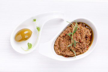 Tapenade – spicy olive paste made from green olives and red hot chilli pepper.