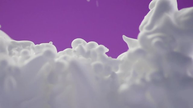 White foam on a purple background.