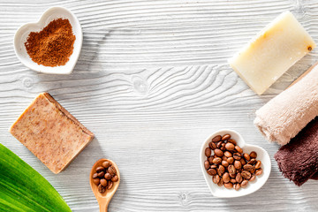 Organic skin care. Coffee soap on wooden table background top view copyspace