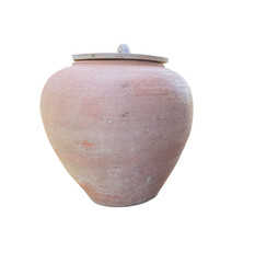 Old earthen jar isolated on white with clipping path