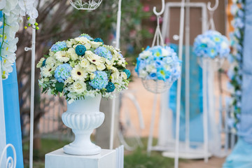 flower in wedding ceremony,blue flower on greek vase