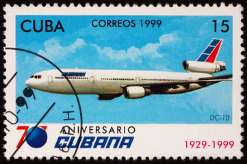 Passenger aircraft Douglas DC-10 on postage stamp