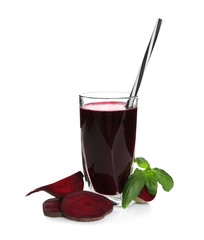 Glass of fresh beet juice on white background