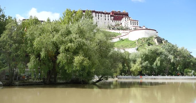 4k Potala in Lhasa,Tibet.lake with willow in lasa park.