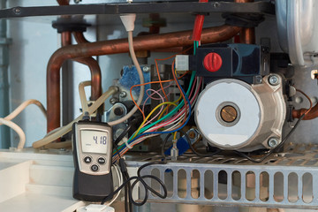 Repair of a gas boiler, setting up and servicing by a service department