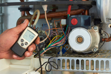 Repair of a gas boiler, setting up and servicing by a service department