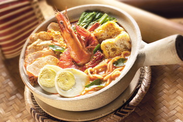 Asian food clay pot curry laksa