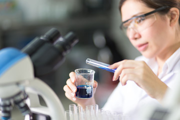 Young medical technicians working in laboratory