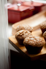 Fresh muffin with oatmeal baked with wholemeal flour and ears of rye grain, concept of delicious, healthy dessert or snack