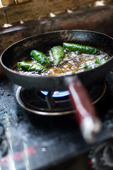 Frying Vietnamese spring rolls