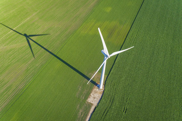 Wind turbine and countryside cornfield, agriculture industry