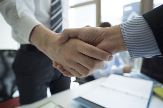 Shaking hands of a businessman