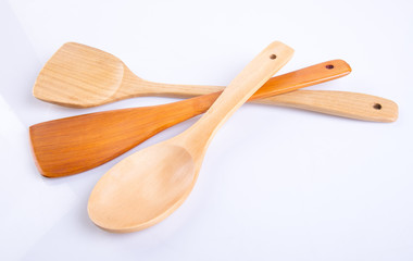 Kitchen utensils or wood kitchen utensils on background.