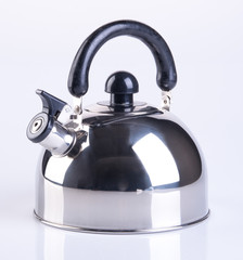 Kettle with whistle on background.