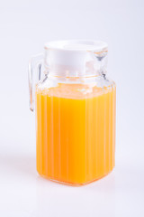 Orange juice or Orange juice in jug on background.